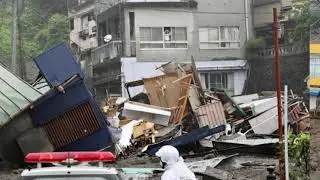 Two dead and at least 20 missing as mudslide west of Tokyo hits houses