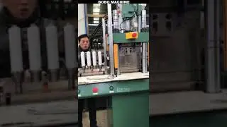 Semi auto vertical laminated tube shoulder injection molding machine