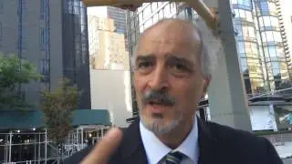 Syrian Ambassador Bashar Jaafari talks to Caleb Maupin