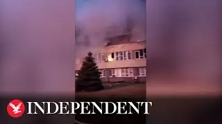 Fire fighters extinguish flames at administrative building of nuclear plant in Enerhodar