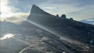 Summiting, Mount Kinabalu, G Adventures from Rebecca F. 🏔️