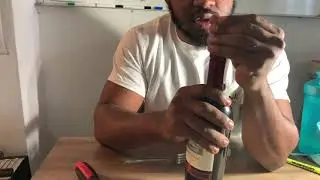 The trick to open a wine bottle without a key.