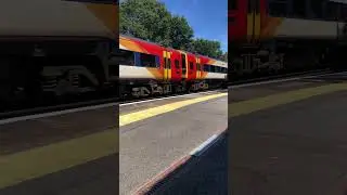 Class 159 passing byfleet and new haw