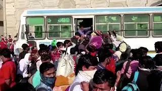 Coronavirus: Huge crowds as India lockdown prompts mass migration