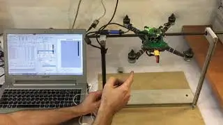 System identification of quadrotor and designing PID attitude (Roll and Pitch) controller