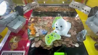 Playing the Harry levy Scooby Doo 2p￼ coin pusher at parkdean warmwell