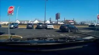 Dashcam: guy drives over curb