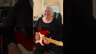 grandma playing guitar