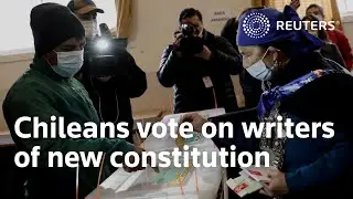 Chileans vote to pick writers of new constitution