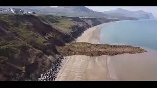 Huge landslide sends hundreds of tons of mud across Welsh beach
