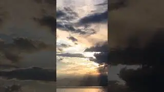 Sunset Behind the Mountains &middot; Dramatic Clouds Over the Sea #mountains #nature #sunset #sea