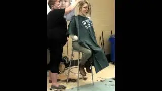 Allie getting her head shaved for St. Baldrick's 2014