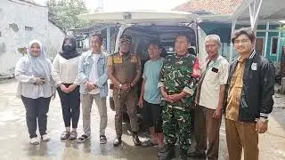 Warga Bojongsari yang terdampak banjir menerima bantuan makan geratis MBG.kedungwaringin.26/1/2026