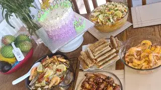 Asian food delight,  Party food , spring rolls, prawns, seafood paella, palabok ,chicken wings