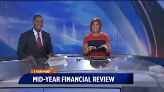 What should be the focus of a mid year financial review?