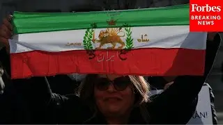 Madrid, Spain Protesters Stomp On Flags In Solidarity With Iran Protests