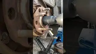 Removing the nuts from axle. #powertoolworks #rust #bearingissue