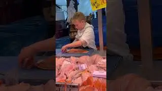 This young man knows what he is doing! #market #fresh #seafood #leiden #netherlands #salmon #local