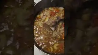 Beef neck and lentil soup with a side of corn fritters. 