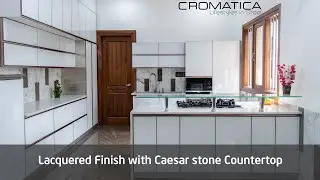 Saint Gobain Lacquered glass shutters with Caesar stone countertop