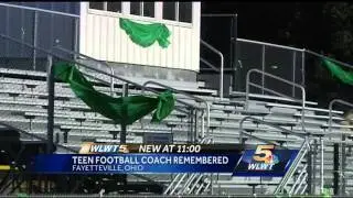 High school football team is honors young coach who died in car wreck