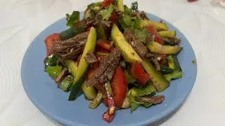 Cucumber Salad. Fresh salad with vegetables and meat.