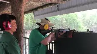 Ken firing M-16 at Cu Chi Tunnels - Saigon, Vietnam