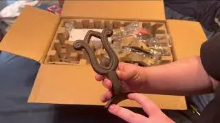 Unboxing a brand new Hampton bay carriage house ii ceiling fan