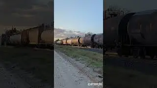 Florida East Coast (FEC) ES44C4 no. 802 and GP40-2 no. 416 in Cocoa, FL.