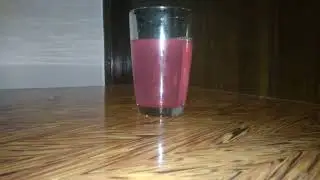 Water getting back to bottle. Magic trick.                Reversed video