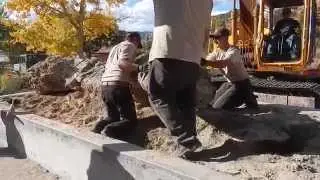 Utah Geological Survey Paleontologists help move a petrified tree