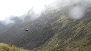 Hughes 500 picking up hunters west coast New Zealand.