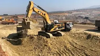 Caterpillar 385C Excavator Loading Mercedes And MAN Trucks - Labrianidis Mining Works