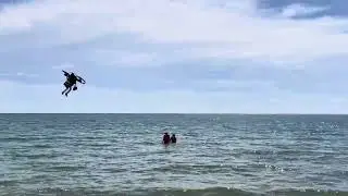 Bicopter fly on sea.
