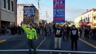 Crazy religious protesters going hard at Halloween Town.