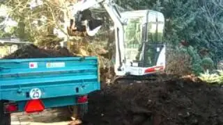 Bobcat one tough animal MINI EXCAVATOR AT WORK