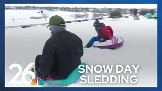 Sledders take over Oshkosh's Red Arrow Park during snow day