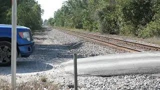 Waiting For Amtrak Silver Meteor a No Crossing Gate Grade.
