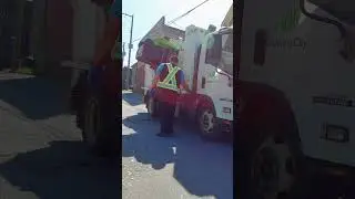 Mini Side Loader Garbage Truck Picks Up Residential Waste Bin in Machine Town