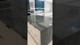 Waterfall Countertop Island at Kitchen. Granite. #waterfall #countertops #kitchendesign #granite