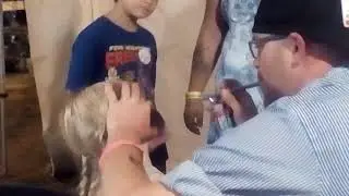 My sister getting a face paint.