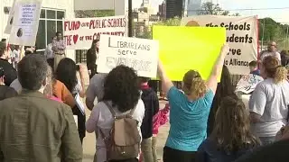 SAISD librarians protest job cuts outside school board meeting