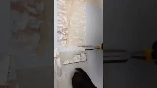 Removing Artex using steamer & chisel