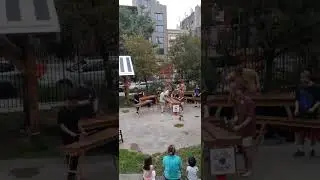 Live music at La Plaza  community garden 9th Street and Avenue C Lower East Side NYC