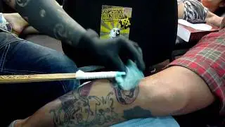 Marc Pinto Traditional Hand Tattoo Artist at work during the Singapore Tattoo Show 2010