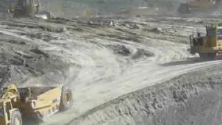 Short clip of just a few of INDEPENDENT construction company's 657E & 651B scrapers passing