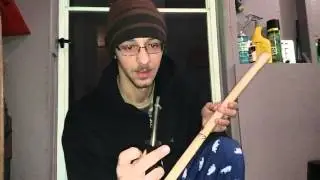 Wood burning a axe handle.