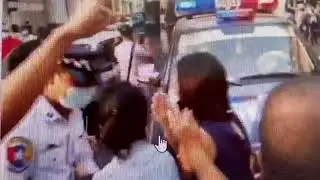 MYANMAR SILENCE Public pleads riot police to stand with people. Chanting 