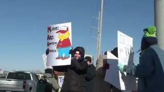 Trump Rally in Iowa met with dozens of protestors
