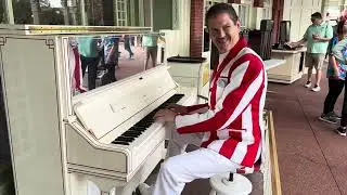 Disneys Pianist Neal playing our Disney Favorites at Casey’s Corner in Magic Kingdom